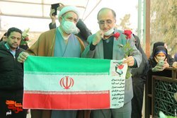 آئین میهمانی لاله‌ها و عطرافشانی گلزارهای مطهر شهدا در استان قم برگزار شد