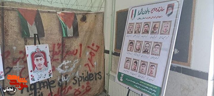 برگزاری نمایشگاه تصاویر شهدای دفاع مقدس ۱۲ روزه و جنگ رمضان در دبیرستان...